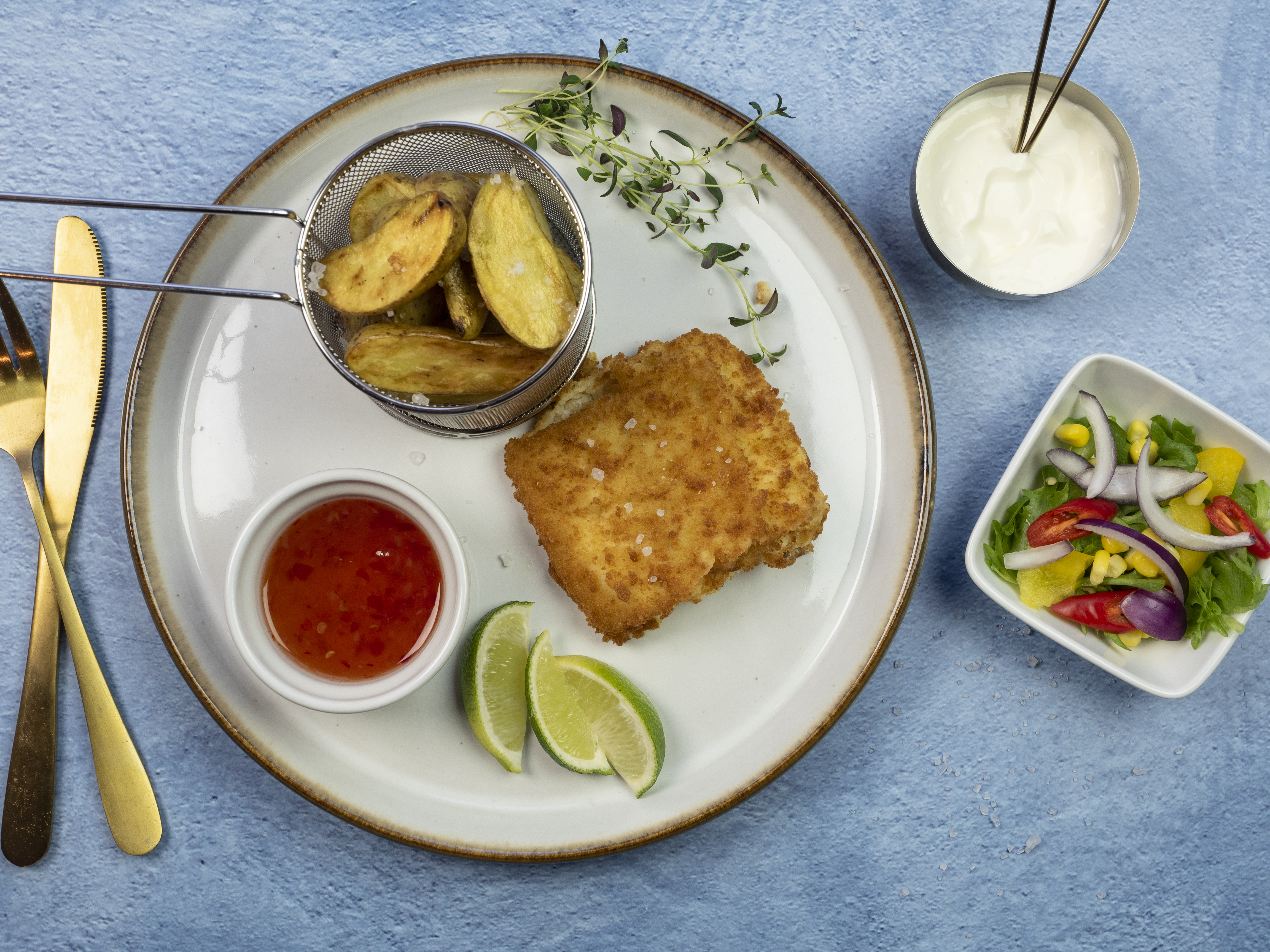 Sprøpanert torskefilet med båtpoteter